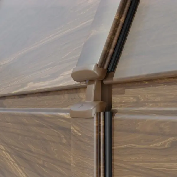 Bisagra invisible con sistema de seguridad antipinzamiento en puerta de garaje seccional imitación madera